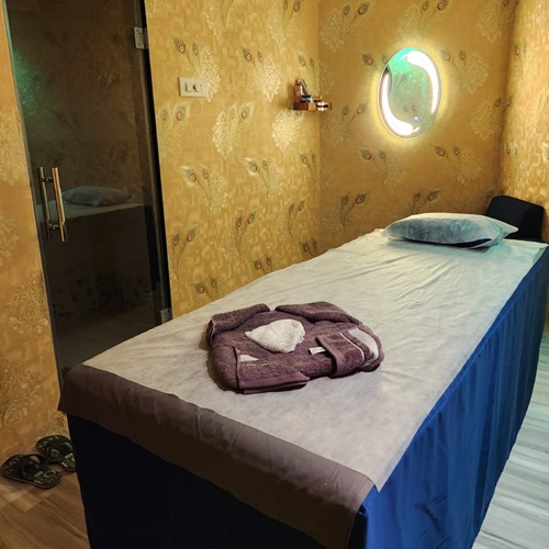 Spa treatment room with soft lighting